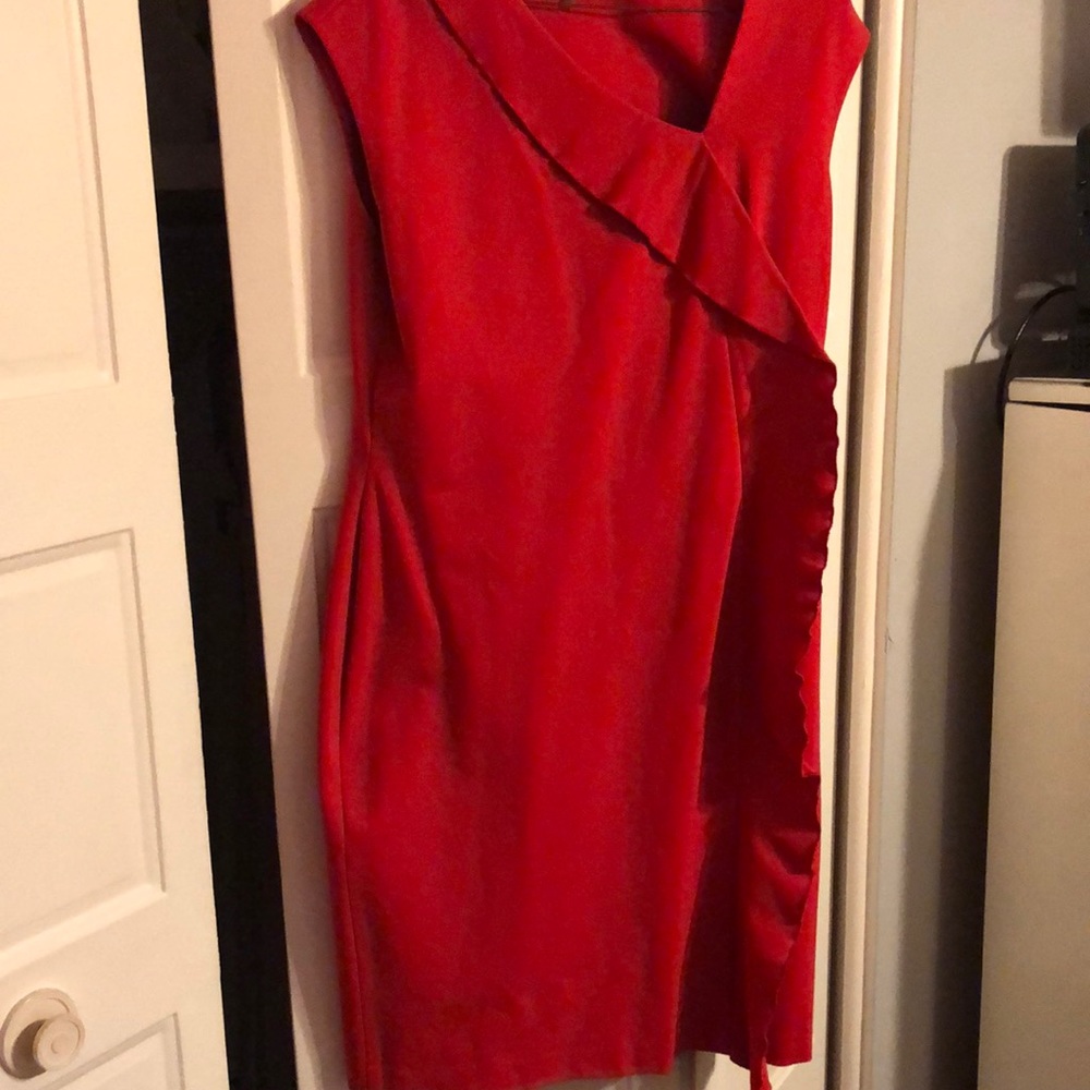 Anne Klein orange dress with fringe detail on the front.